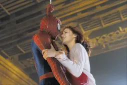 Mary Jane holds onto Spider-Man