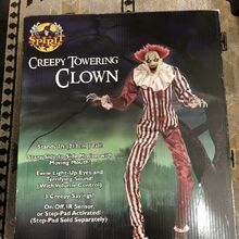 Creepy Towering Clown Spirit Halloween Wikia Fandom This animatronics halloween decoration is a ghostly mom and child that rocks back. creepy towering clown spirit