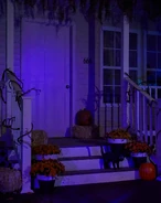 Prop light shining on a front door