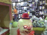 Setup in Zombie Baby Scary Swings display with costume accessory