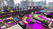 A view of Inkopolis' many large buildings.