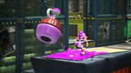 An Octoling boy throwing the Torpedo.