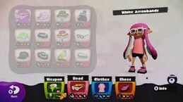 An Inkling in the Equip Menu with the White Arrowbands.