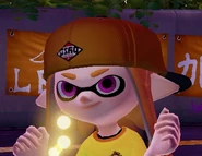 Nahaufnahme eines anderen weiblichen Inklings, der die Umgedrehte Kappe trägt.