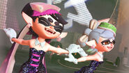 The Squid Sisters performing during the Grand Festival in their standard outfits
