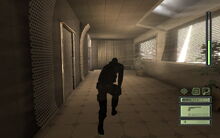 Fisher sneaks through the North Wing to find a way inside Nikoladze's office.