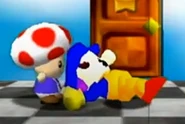Toad dragging TBM's lifeless body on the ground in Super Mario 64 Commercial: The SMG4 Weight Losers