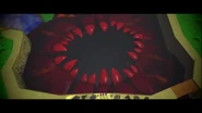 The Malice's enormous maw.