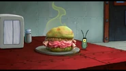 Pomyjoburger (jedno z dań w Kuble Pomyj) w filmie "SpongeBob: na suchym lądzie".