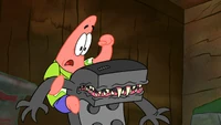 Patrick fights the remoto dragon.