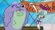 Squidward signing the bubba fish's forehead.