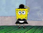 SpongeBob looks at the audience while putting on his maid outfit.