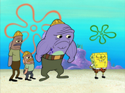 Three construction workers with 