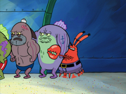 Mr. Krabs behind the bubba fish.