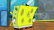 The last few notes of the theme song play as the wind whistles through SpongeBob's pores.