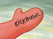 Patrick reads out "kickboxer" on his hand to remind himself