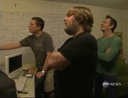 Nate Cash pitching the rough board to Vincent Waller and Paul Tibbitt.