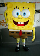 An earlier version of the same costume, used from 2001 to around 2003. This version had a slightly wider mouth, bigger eyes, and a soft, sponge-like texture. It was also used in the episode "SpongeGuard on Duty"