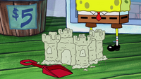 SpongeBob realizes the patty is made of sand.