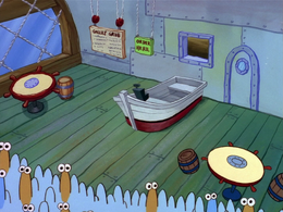 reactions on X: sad spongebob fish sitting at krusty krab table