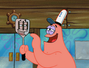 Patrick's reflection with pink eyelids instead of purple.