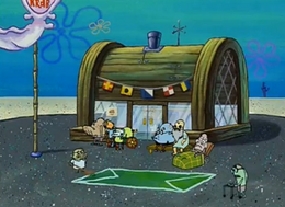 The Krabby Patty sign is shown on the Rusty Krab window on the left; The Galley Grub is also seen.
