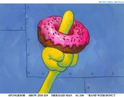 Unused shot of SpongeBob's hand with a donut