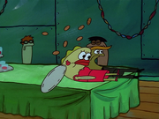 Teen 7 sliding on a table with .