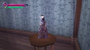 A broken doll found at the entrance, near the save point.