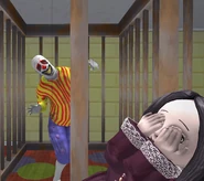 The Doll covering its eyes in front of The Clown.