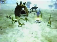 A tribe of Willosaurs dancing around a fire