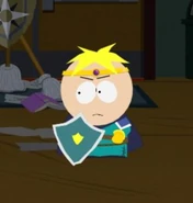 Butters with the "Shield of Righteousness" during his boss battle.
