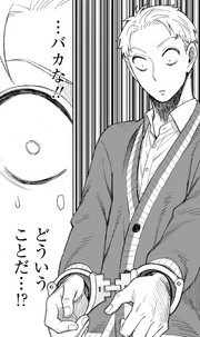 Loid is handcuffed