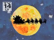 Santa Claus and his reindeer next to the moon
