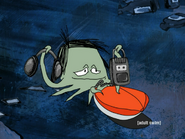 Early Cuyler holding headphones and a Walkman