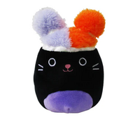 A black cat with dual-tone hair poms.