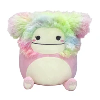 A photo of a pink and rainbow bigfoot plush.