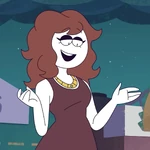 Carmen standing outside at night.