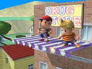 Ness and Lucas on the topmost awning of the drug store.