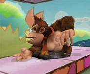 Donkey Kong is buried in the ground, making him unable to move, attack and so on for a few moments.