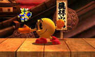 Pac-Man's side taunt featuring Gilgamesh.