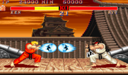 The Hadoken move being performed by Ryu and Ken in Street Fighter II.