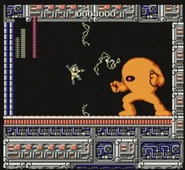 Mega Man fighting the Yellow Devil in the first Mega Man game