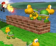 Mario throwing fireballs at Koopa Troopas