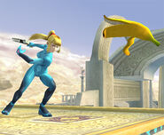 Zero Suit Samus throwing a Banana Peel.