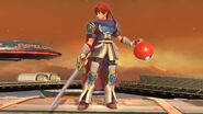 Roy holding the Poké Ball item.