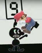 Mr. Game & Watch hitting Mario with a 9