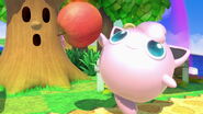 Jigglypuff holding an apple.