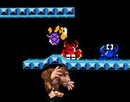 Donkey Kong bumping a Shellcreeper and Sidestepper from below.