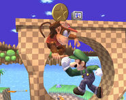 Luigi taking a coin with his Super Jump Punch in Super Smash Bros. Brawl.